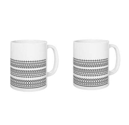 Kubek na kawę z ukrytą wiadomością "Pieprzyć to gówno"